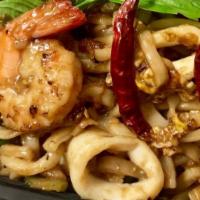 Drunken Udon Seafood · Spicy. Stir-fried udon noodles with mixed seafood with spicy chili garlic sauce.