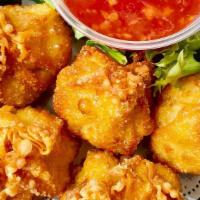 Chicken&Shrimp Fritters · Fried mixed chicken and shrimp dumpling. Served with soy-vinaigrette dipping sauce.