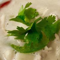 Tom Kha Soup · Coconut lemongrass soup with coconut milk, roasted chilies, kaffir lime leaf, lime juice, mu...