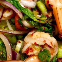 Plah Kung (Shrimp Salad) · Cooked shrimp with shallot, scallion, chili, Thai chili paste, and mint in spicy lime juice ...