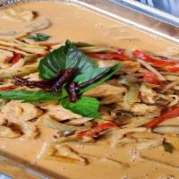 Red Curry · Very spicy. Red curry sauce, coconut milk, bamboo shoot, basil, and bell pepper.