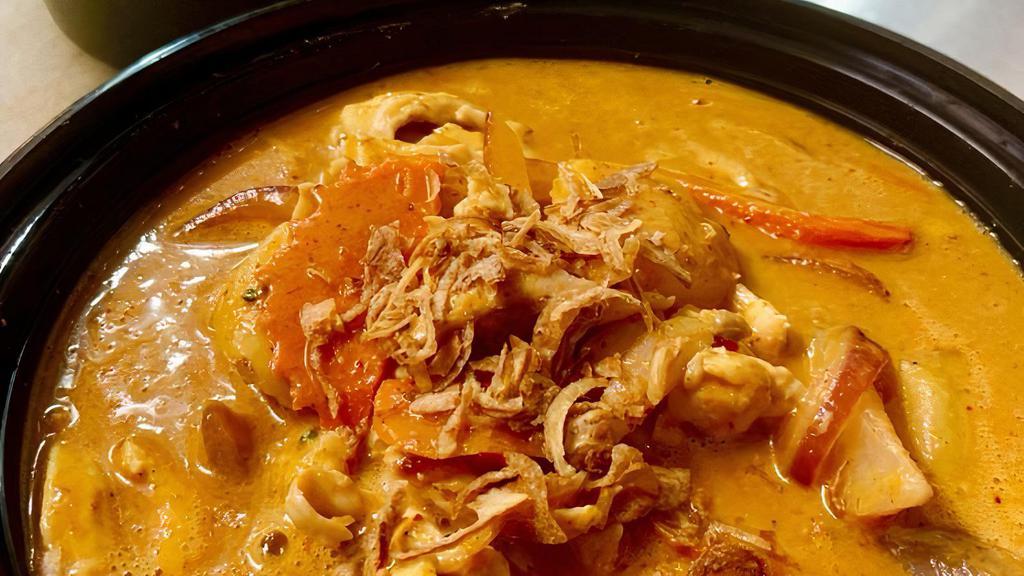 Massamun Curry · Spicy. Massaman curry sauce, potato, roasted peanuts, and onions.