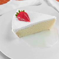 Tres Leches Cake · Traditional Mexican sponge cake.