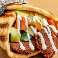 Falafel Gyro · Freshly cooked all vegetarian balls, consisting of ground chick peas and our combination of ...