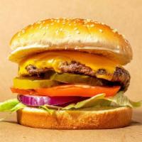 Cheese Burger · 5 oz beef patty grilled to perfection topped with melted american cheese, lettuce, tomato, p...