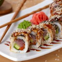 The Dragon Roll · Spicy tuna, cucumber with avocado and spicy mayo on top.