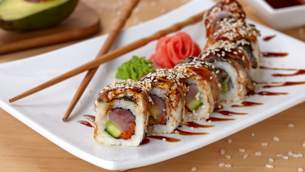 The Crispy Dragon Roll · California roll topped with spicy tuna and crunch.