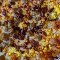 Breakfast Pizza Calzone · White Sauce, eggs, cheese and bacon or sausage