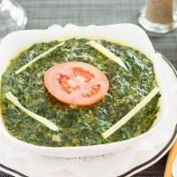 Sag Panner (Gf) · Homemade cheese cubes cooked with delicately spiced spinach sauce.