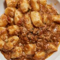 Gnocchi Al Ragu' Di Manzo E Maiale · homemade potato gnocchi in beef and pork ragu'
