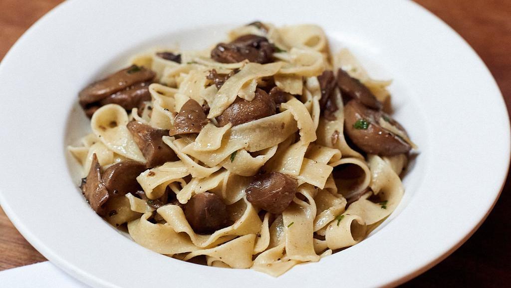 Fettuccine Ai Funghi · homemade fettuccine with mixed wild mushrooms sautéed in garlic and olive oil