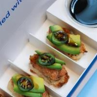Spicy Tuna Crispy Rice · 4 pieces of Spicy Tuna with avocado, jalapeno and eel sauce atop air fried crispy rice