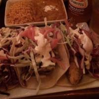 3 Fish Tacos · Beer battered cod, pickled red onion, lime crema and slaw. 3 tacos in hard or soft shell ser...