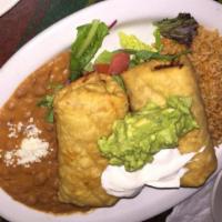 2 Chimichangas · 2 deep-fried burritos filled with refried beans and Monterey Jack. Served with guacamole, cr...
