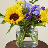 Flutter By · The cheerful Flutter By Bouquet is guaranteed to make every recipient smile. Designed with e...