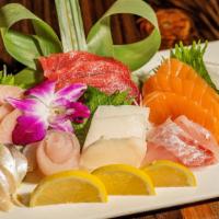 Sashimi Deluxe · 21 pieces assorted raw fish.