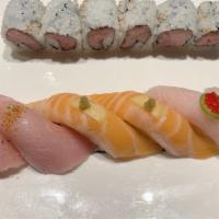 Toro Lounge  · 2pcs each of toro,salmon belly ,yellowtail belly sushi and one toro scallion roll