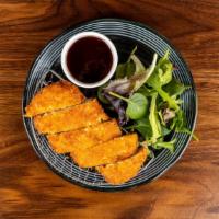 Tonkatsu (Fried Pork Cutlet) · Fried pork cutlet, lettuce, tonkatsu sauce.