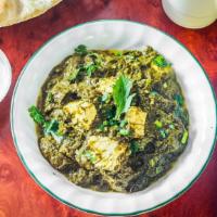 Palak Paneer · Homemade cheese, cooked in spinach, herbs, and spices.