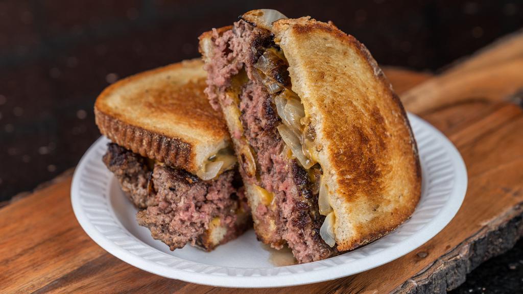 Patty Melt Specialty Burger · Buttered rye bread, melted cheese, fried onion, and 6 oz burger.