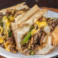 Famous Philly Cheesesteak · Serves with peppers and onions.