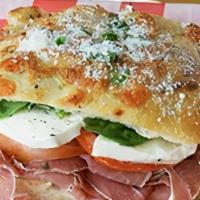 Prosciutto Street Sandwich · Prosciutto, Fresh Mozz, Tomato, Basil, Olive Oil on Freshly Made . Focaccia