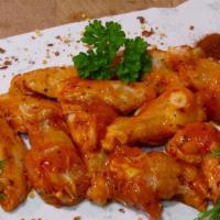 Chicken Wings (8) · Served with blue cheese dressing & hot sauce