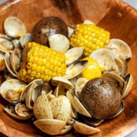 Clams · Boiled and tossed with one of signature seasoning. Served in a bag. Comes with corn and pota...