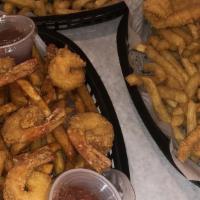 Fried Tilapia Fish Basket (4 Pcs.) · Comes with Cajun fries or French fries.