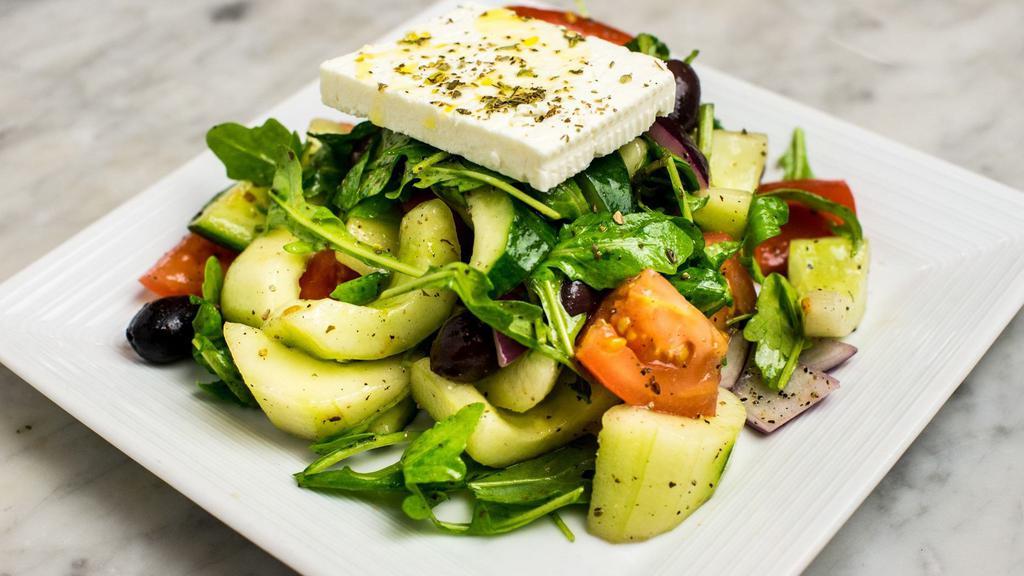 Taverna Style Greek Salad (Small) · Tomatoes, onion, cucumber, barrel aged feta.