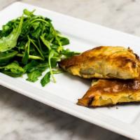 Spinach Triangles · Horta, feta, leeks and dill baked in phyllo.