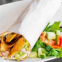 Chicken Gyro Pita · Layers of chicken with lettuce, tomatoes, onions & our famous organic tzatziki sauce.