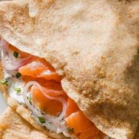 Smoked Out Salmon Crepe · Smoked salmon, cream cheese, organic spinach, capers, tomatoes & red onions