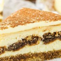 The Tiramisu Crepe · A whole piece of tiramisu cake is centered and warmed inside a crepe. Topped off with Nutell...