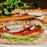 Lunch Grilled Chicken Sandwich · With lettuce and tomato. Served with side salad.