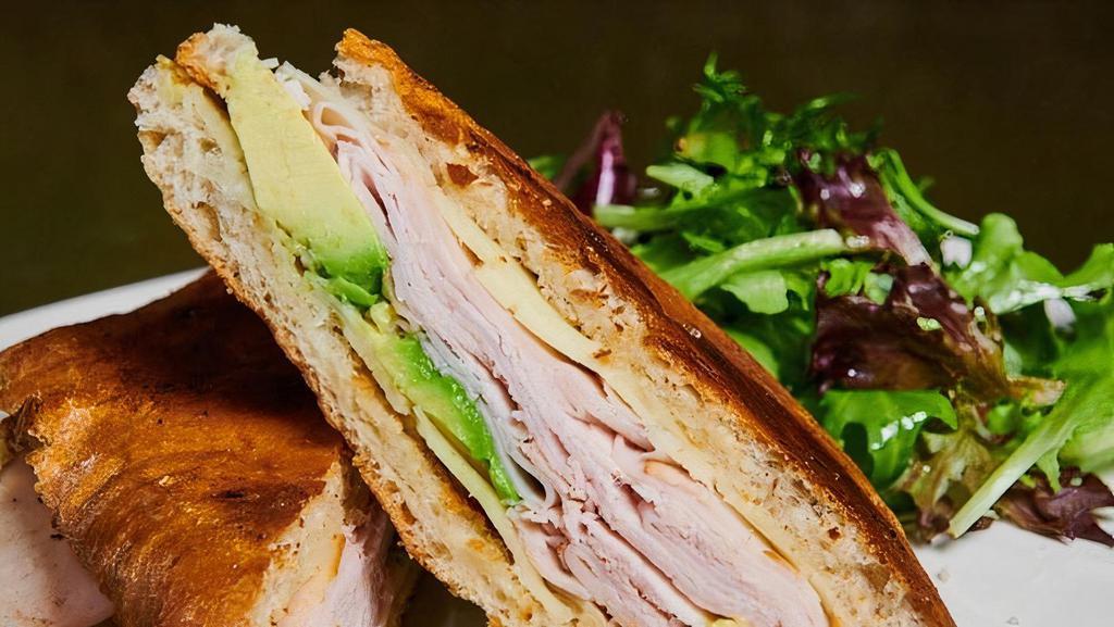 Lunch Smoked Turkey Sandwich · With provolone and avocado. Served with side salad.
