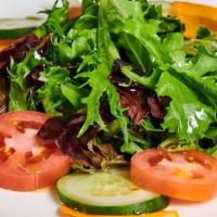 Lunch Mesclun Salad · Mesclun, tomato, carrots, cucumber and extra virgin olive oil.