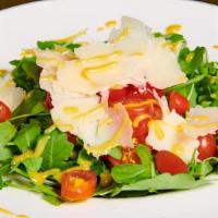 Lunch Contadina · Baby arugula, fresh tomato, flaked Parmesan cheese, EVOO and mustard dressing.