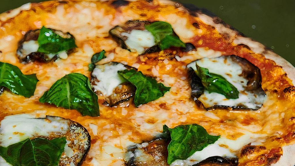 Vegan Parmigiana Pizza · Vegan Mozzarella cheese, tomato sauce, egg plant and basil