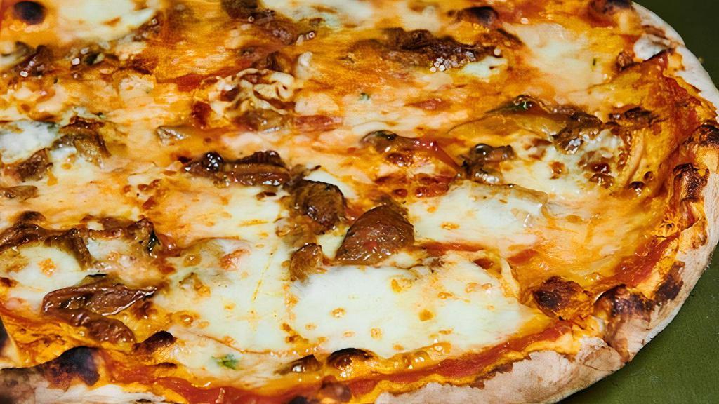 Vegan Porcini · Vegan Mozzarella cheese, tomato sauce and porcini mushrooms