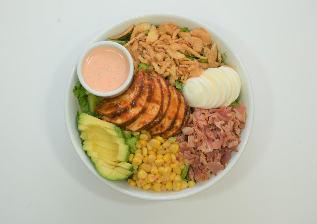 Bbq Chicken Cobb · BBQ Grilled Chicken, Bacon Bits, Half Avocado, Hard Boiled Egg, Roasted Corn, Crispy Onions & Crisp Romaine.

We Recommend Our Chipotle Ranch Dressing.