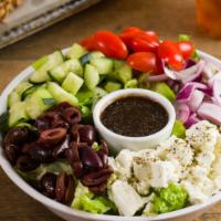 Greek Salad · Feta Cheese, Kalamata Olives, Tomatoes, Bell Peppers, Red Onions, Cucumbers & Crisp Romaine....