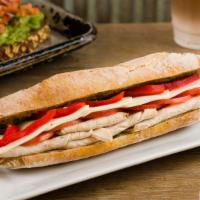 Chicken Calabrese · Grilled Chicken, Tomatoes, Roasted Red Peppers, Fresh Mozzarella with Pesto Aioli on Ciabatt...