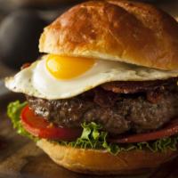 Texas Burger · Deliciously prepared burger including a beef patty, egg, lettuce, bacon, tomato, onion, pick...
