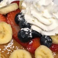 Pancakes With Fresh Fruit · Served with butter and syrup.