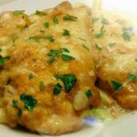 Chicken Francaise · Chicken breast sautéed with francaise sauce over pasta served with soup or salad.