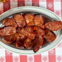 Spanish Sausages/Chorizo Espanol · Sliced broiled Chorizo, great for sharing.