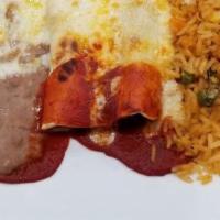 Enchiladas · Three soft corn tortillas rolled stuffed with cheese topped with a mild red sauce.
