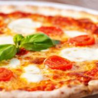 Margherita Pizza · Fresh rolled pizza dough topped with marinara sauce, fresh mozzarella, extra virgin olive oi...