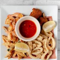Frito Misto · Fried shrimp, fried calamari, fried monk fish, shoestring zucchini.